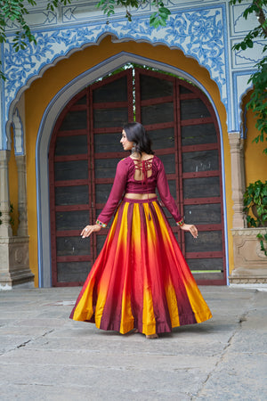 Red and yellow lehenga with traditional embroidery