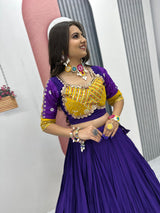 "Close-up of thread and sequence work on lehenga"

