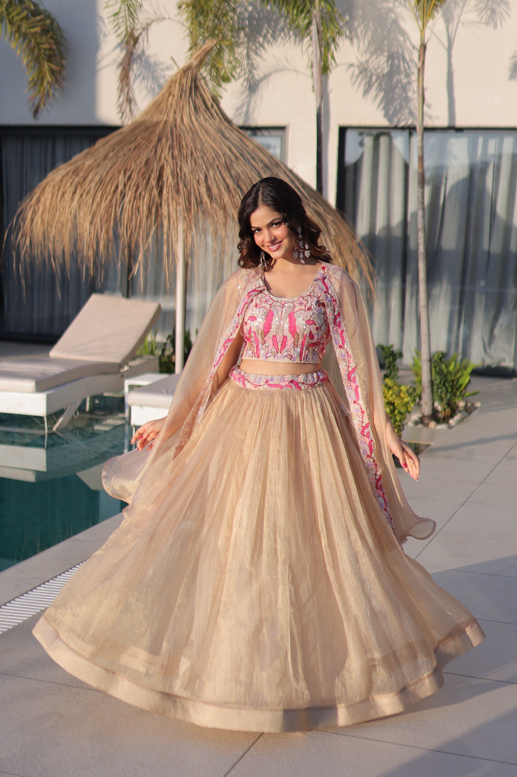 Beige sindur silk lehenga with embroidered blouse and shrug
