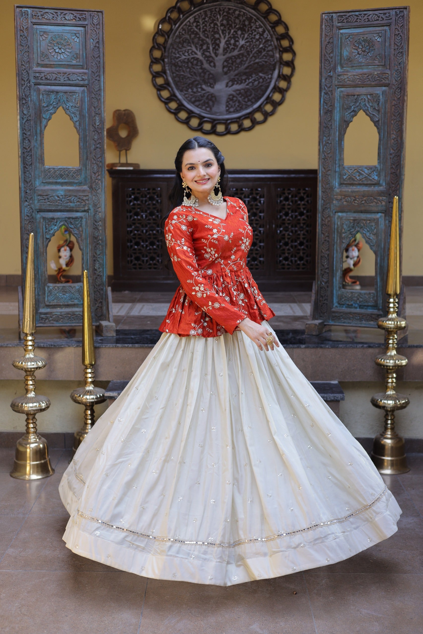 This party wear lehenga set with crop top combines traditional embroidery with trendy design for a stylish look.