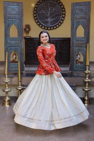 This party wear lehenga set with crop top combines traditional embroidery with trendy design for a stylish look.