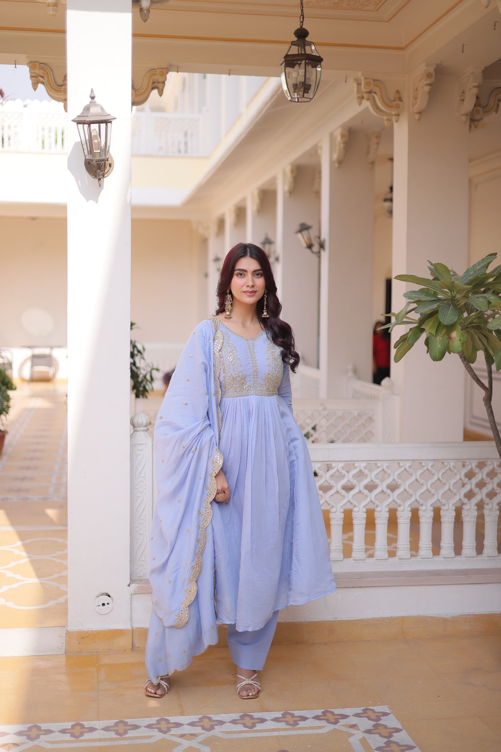 This Mal Chanderi gown set is perfect for festive and wedding occasions with elegant embroidery work