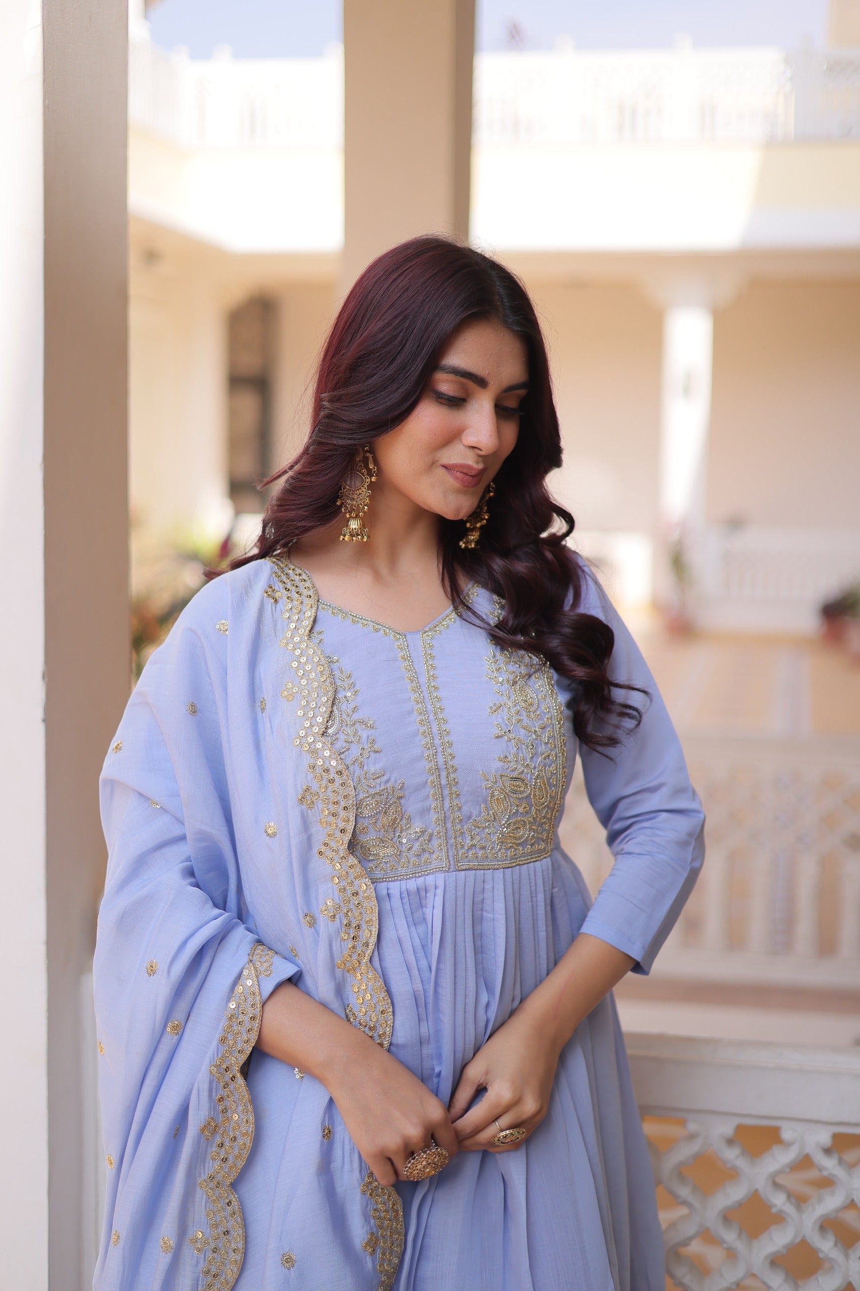 Embroidered ethnic gown set with V neck and long sleeves for festive styling