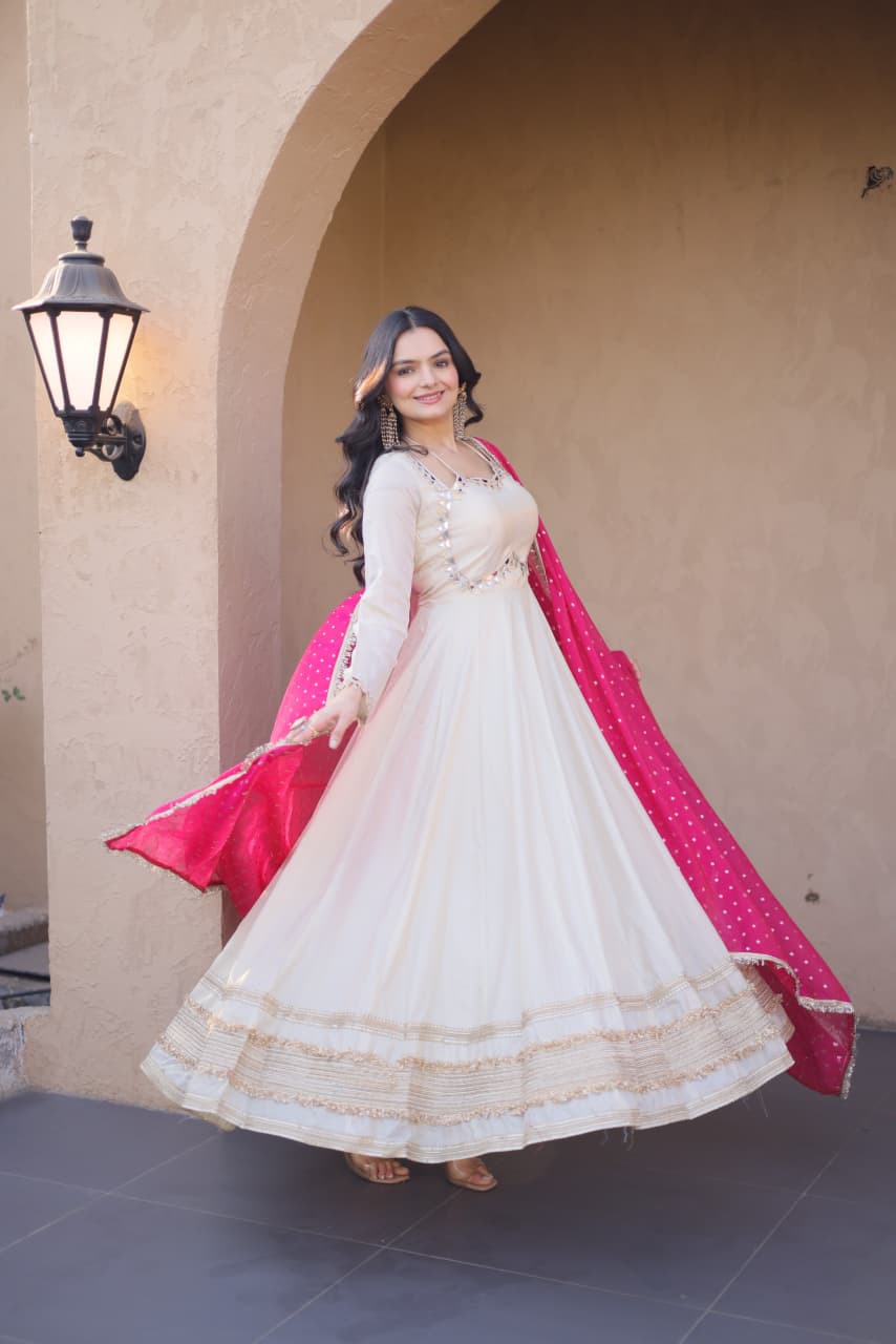Indian ethnic gown set with mirror work and stylish neckline design