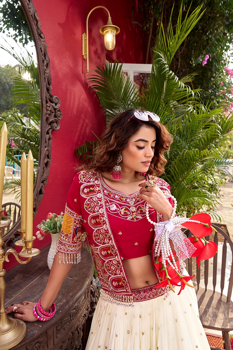 This designer lehenga choli set with koti is ideal for Navratri, sangeet, and wedding wear, featuring heavy embroidery on rich Vichitra fabric for a royal ethnic look.