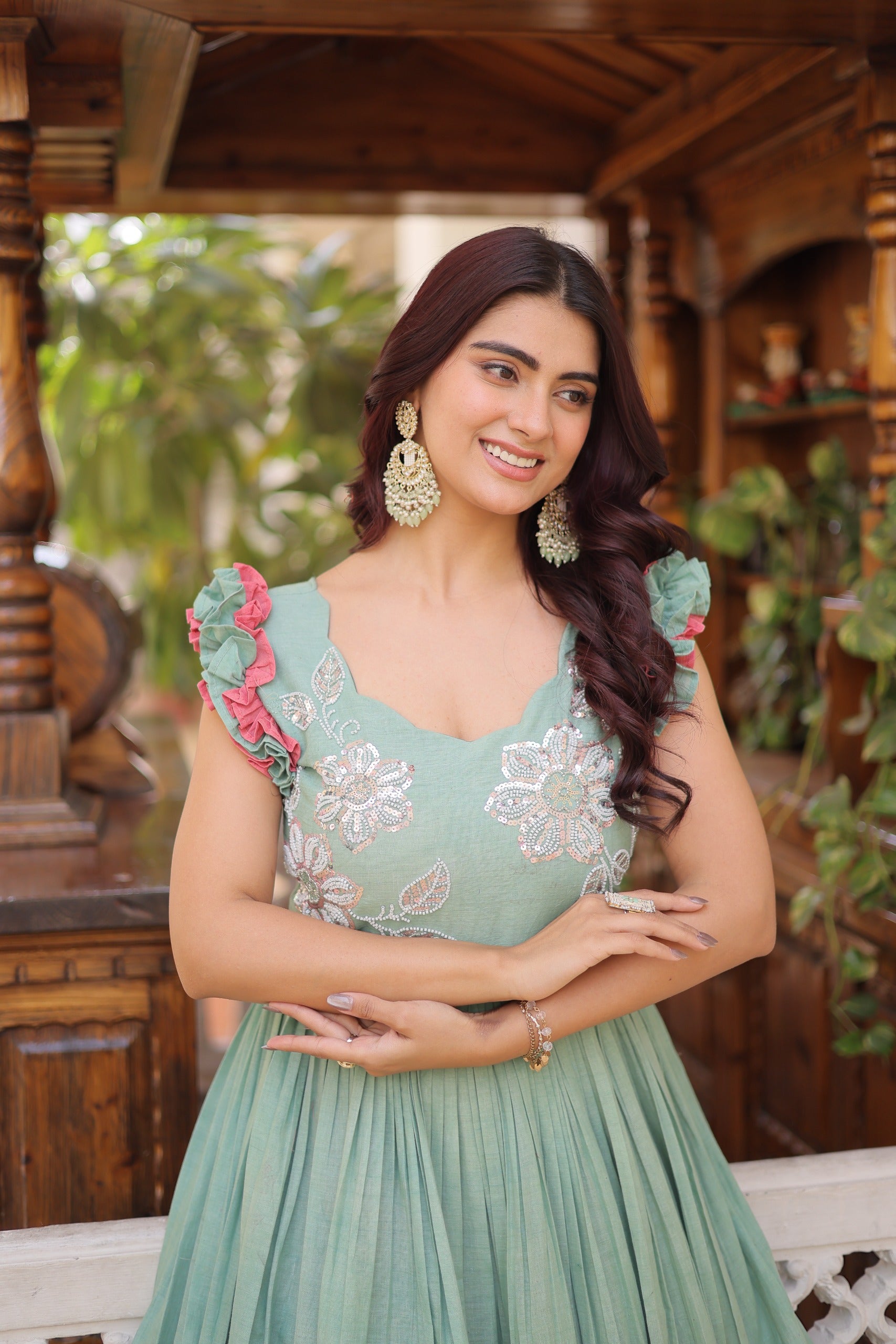 Sleeveless festive cotton gown with frill sleeves