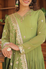 green embroidered gown