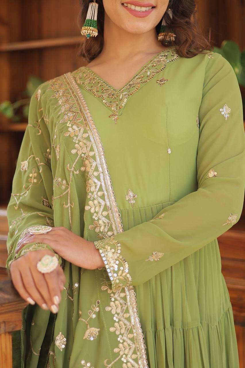green embroidered gown
