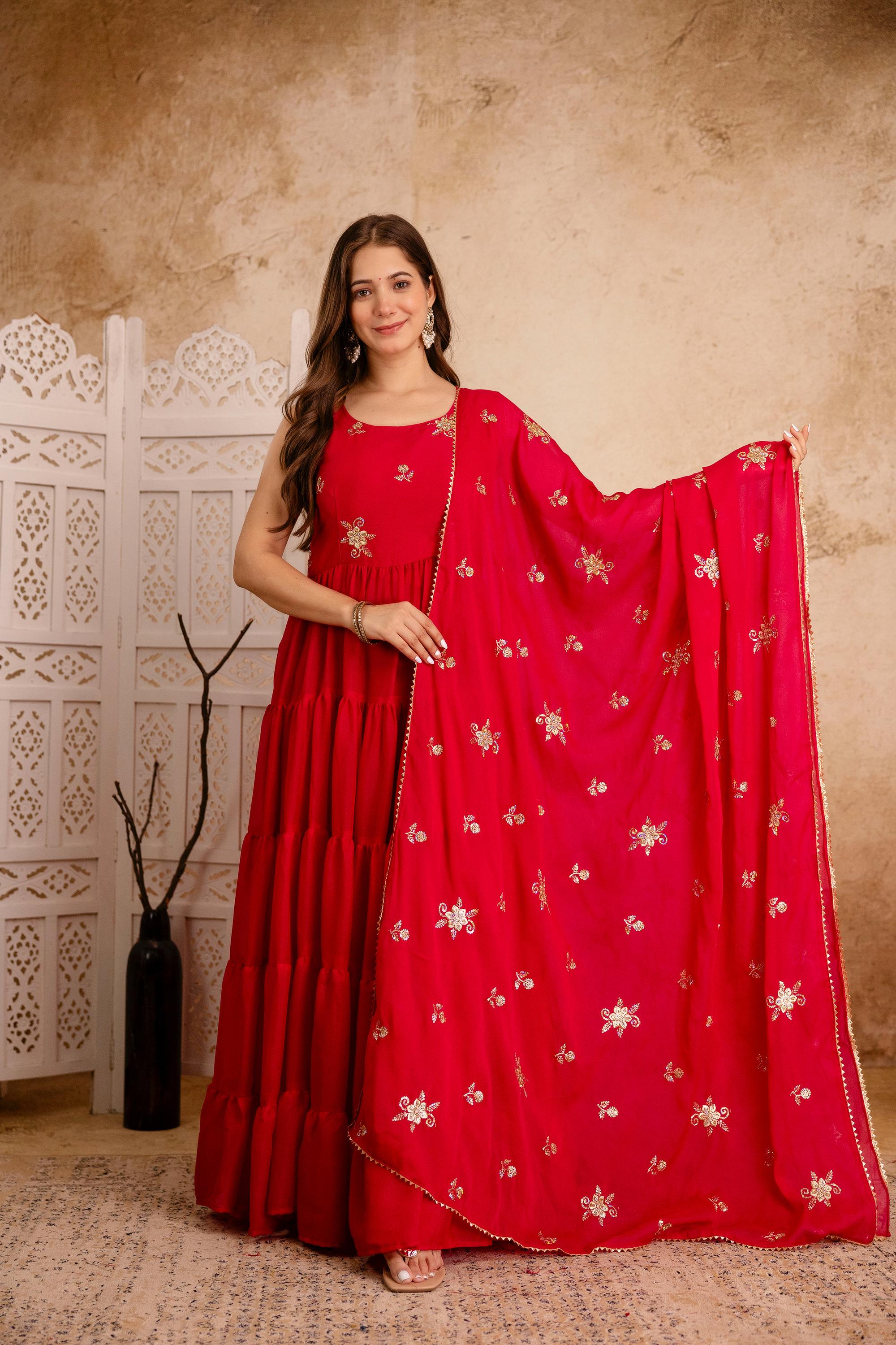 Elegant Indian woman wearing triple layered flair Anarkali dress