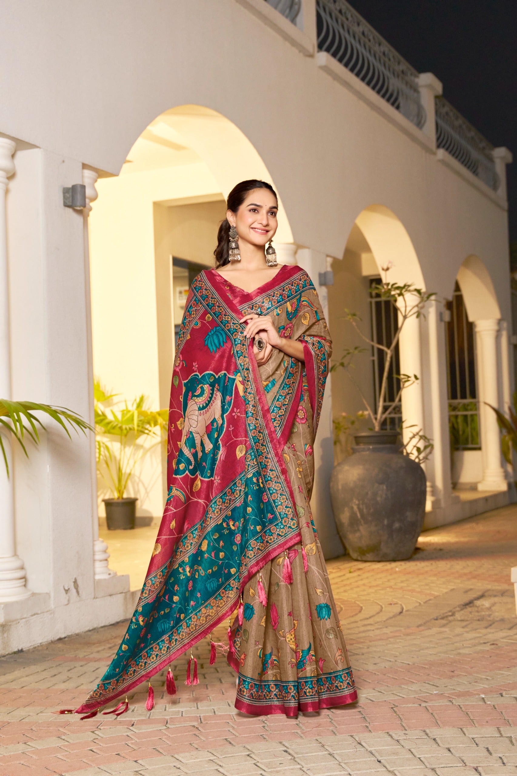 Festive handloom saree with teal ethnic border