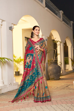 Festive handloom saree with teal ethnic border