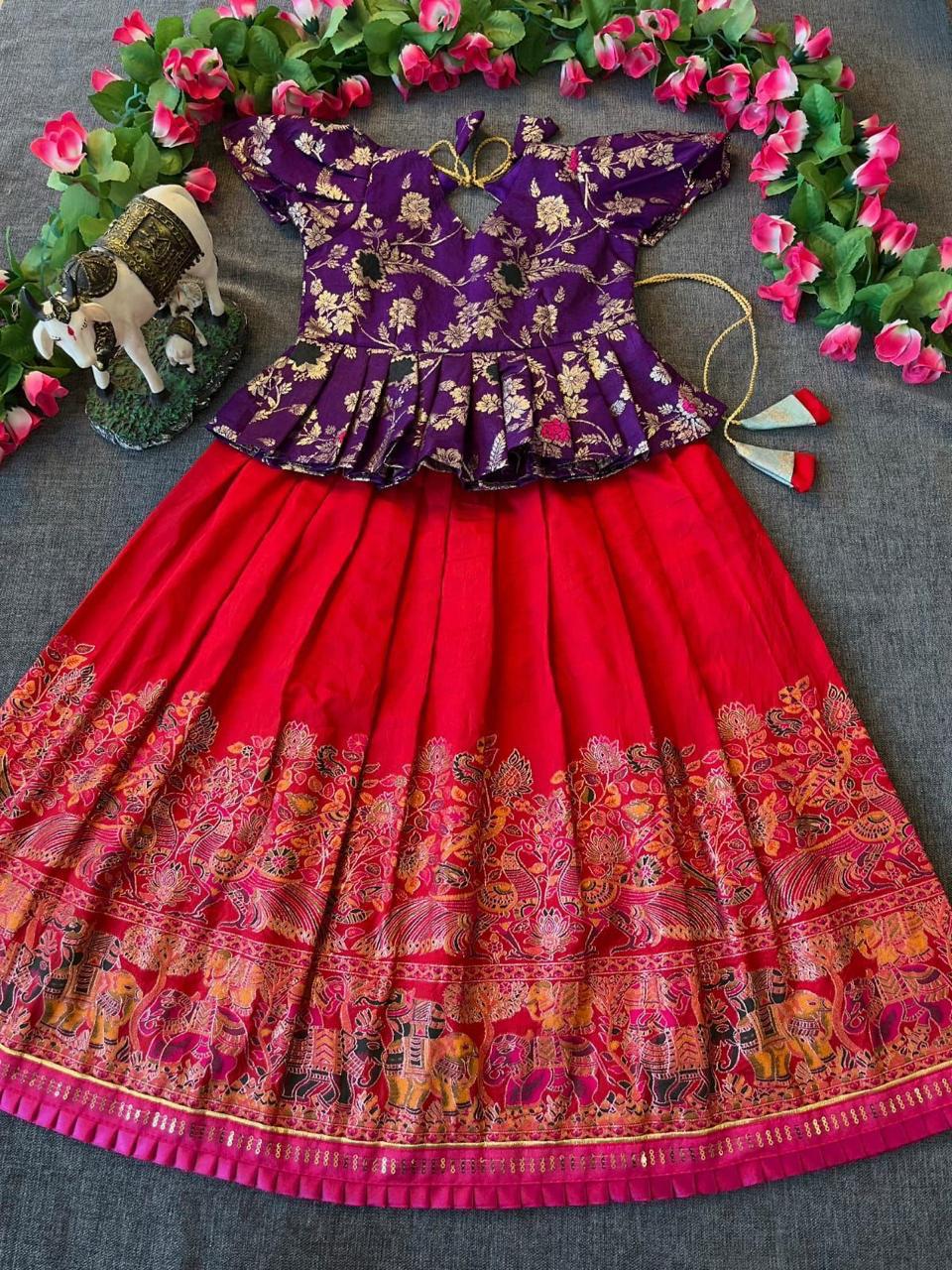 Traditional outfit with a purple top and red skirt on a floral background