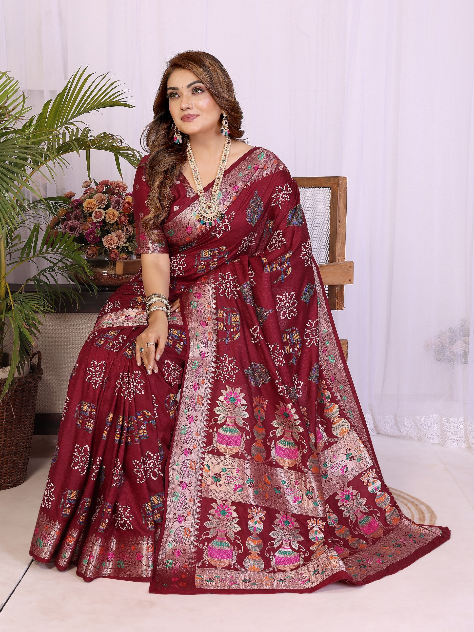 Maroon colour Dola Silk Bandhej Saree Online For Women