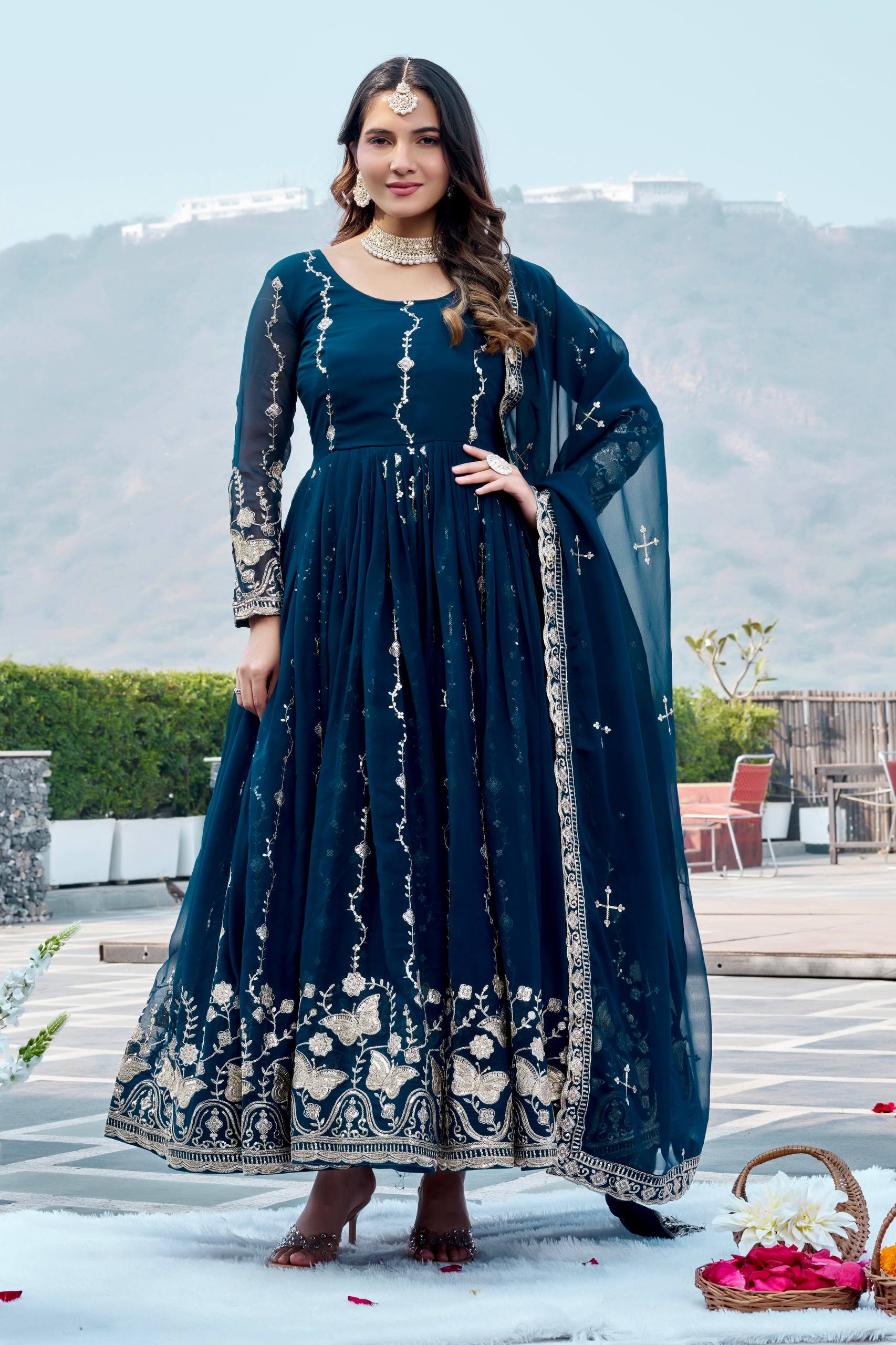 blue party wear embroidered gown for women