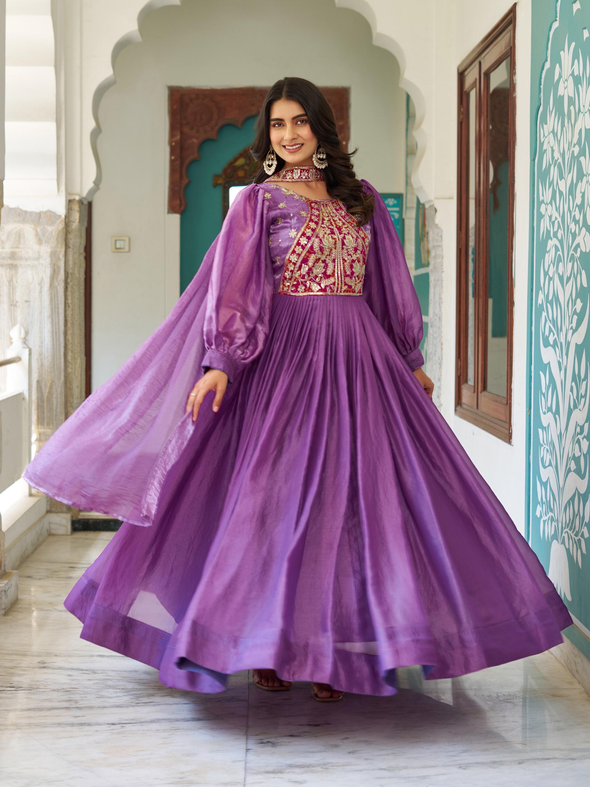 Lavender Fendy silk gown with heavy sequence work
