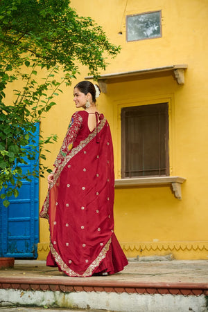 Stunning Maroon gown with zari embroidery and full sleeves