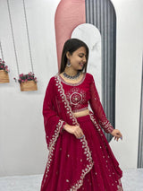 Close-up of maroon blouse embroidery