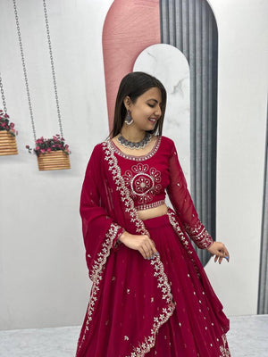 Close-up of maroon blouse embroidery