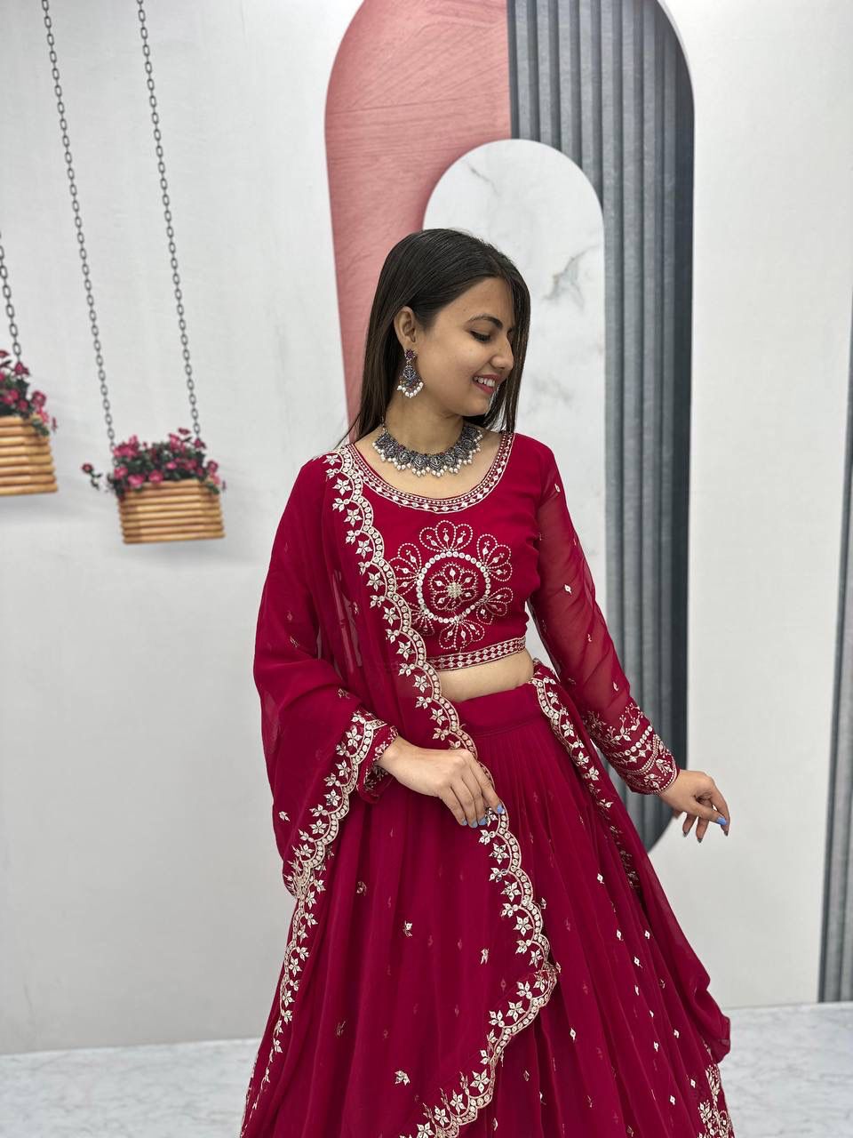 Close-up of maroon blouse embroidery