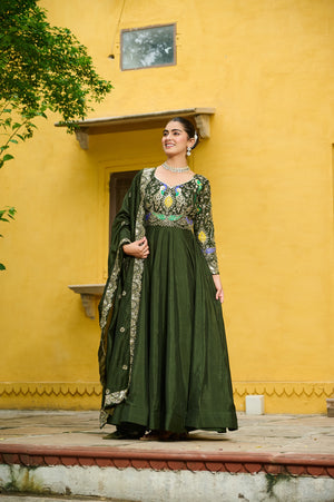 Elegant Mehendi Vichitra fabric gown with intricate zari embroidery and full sleeves
