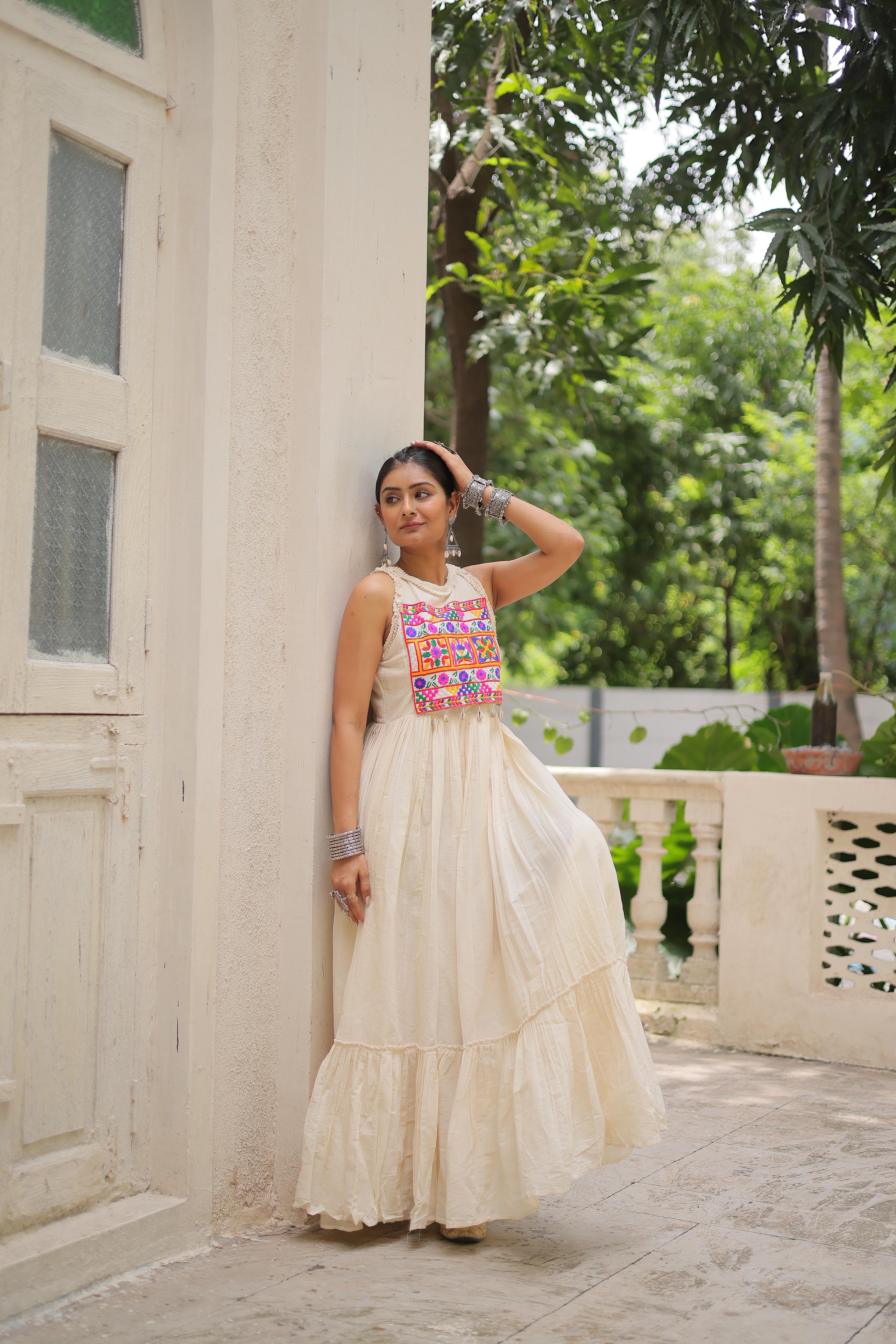Side view of off-white traditional festival gown