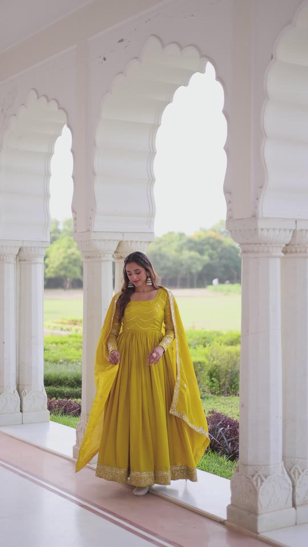 yellow colour Festive wear gown vastralyn gown collection