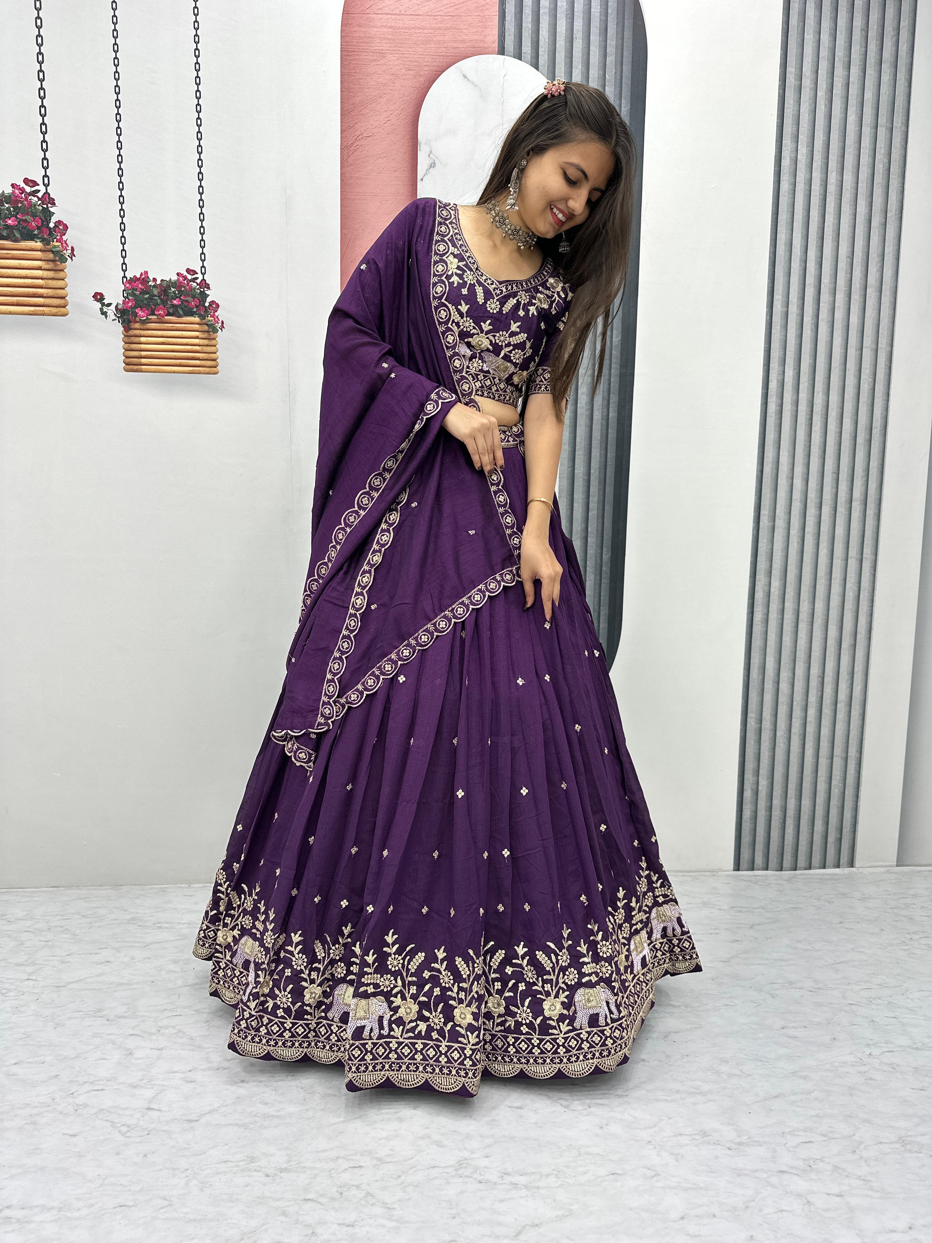 Purple lehenga hemline with embellished elephant and floral border