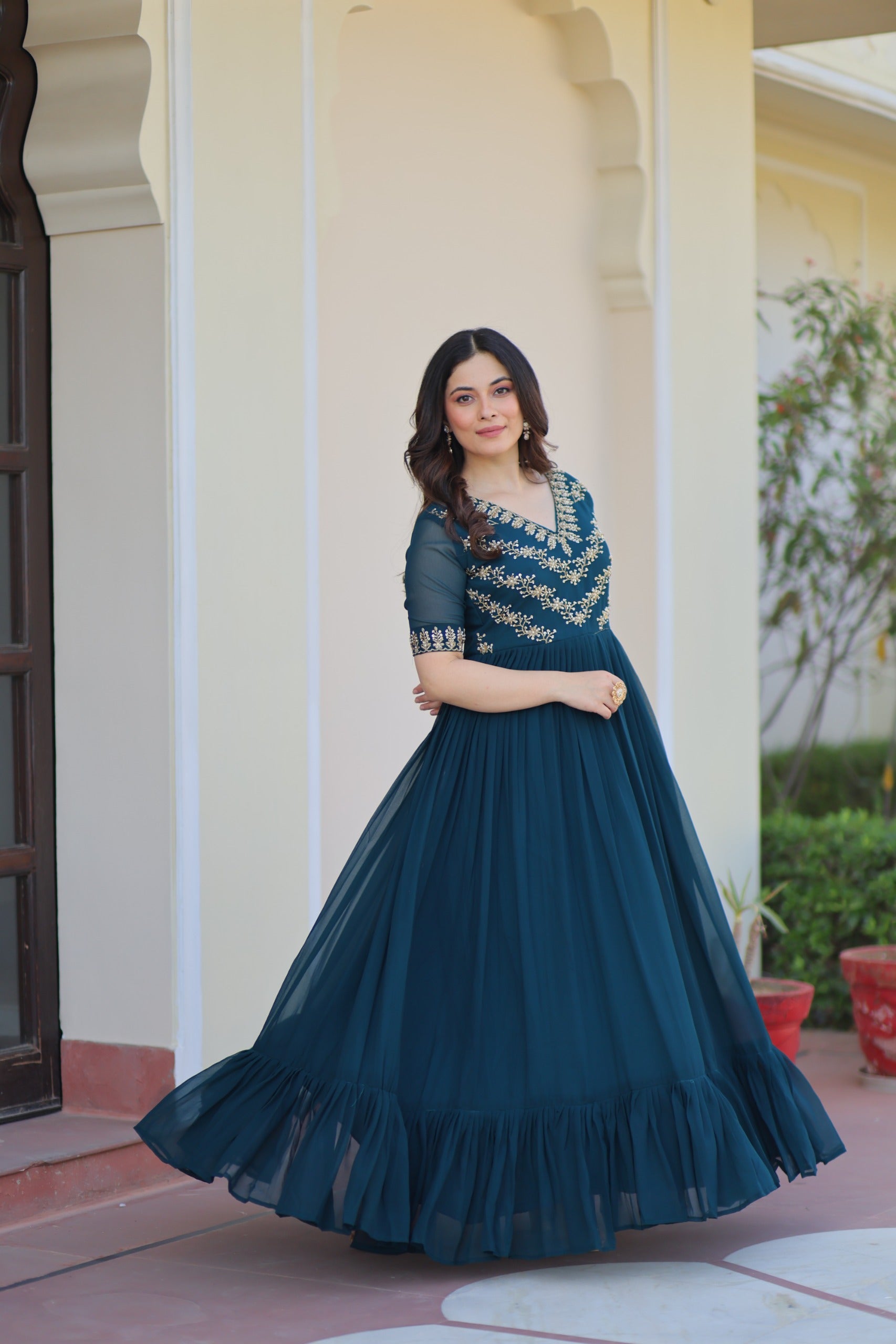 Fancy party wear Rama gown featuring multi-thread and bead design