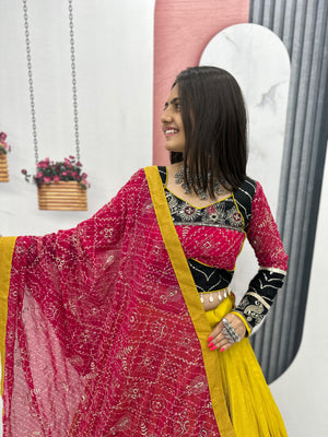 Close-up of choli embroidery and mirror work