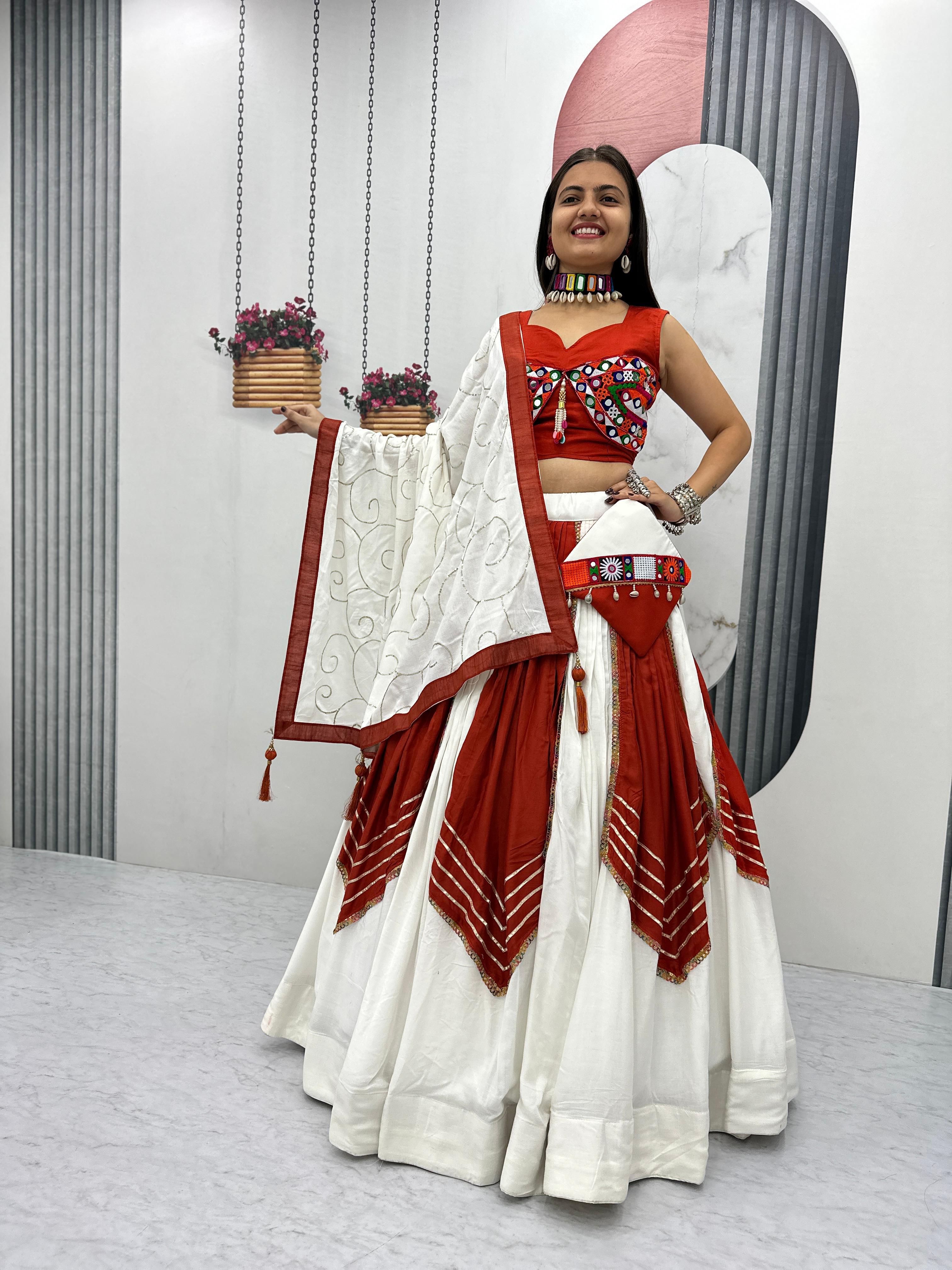Rust and white Gamathi work lehenga choli front view

