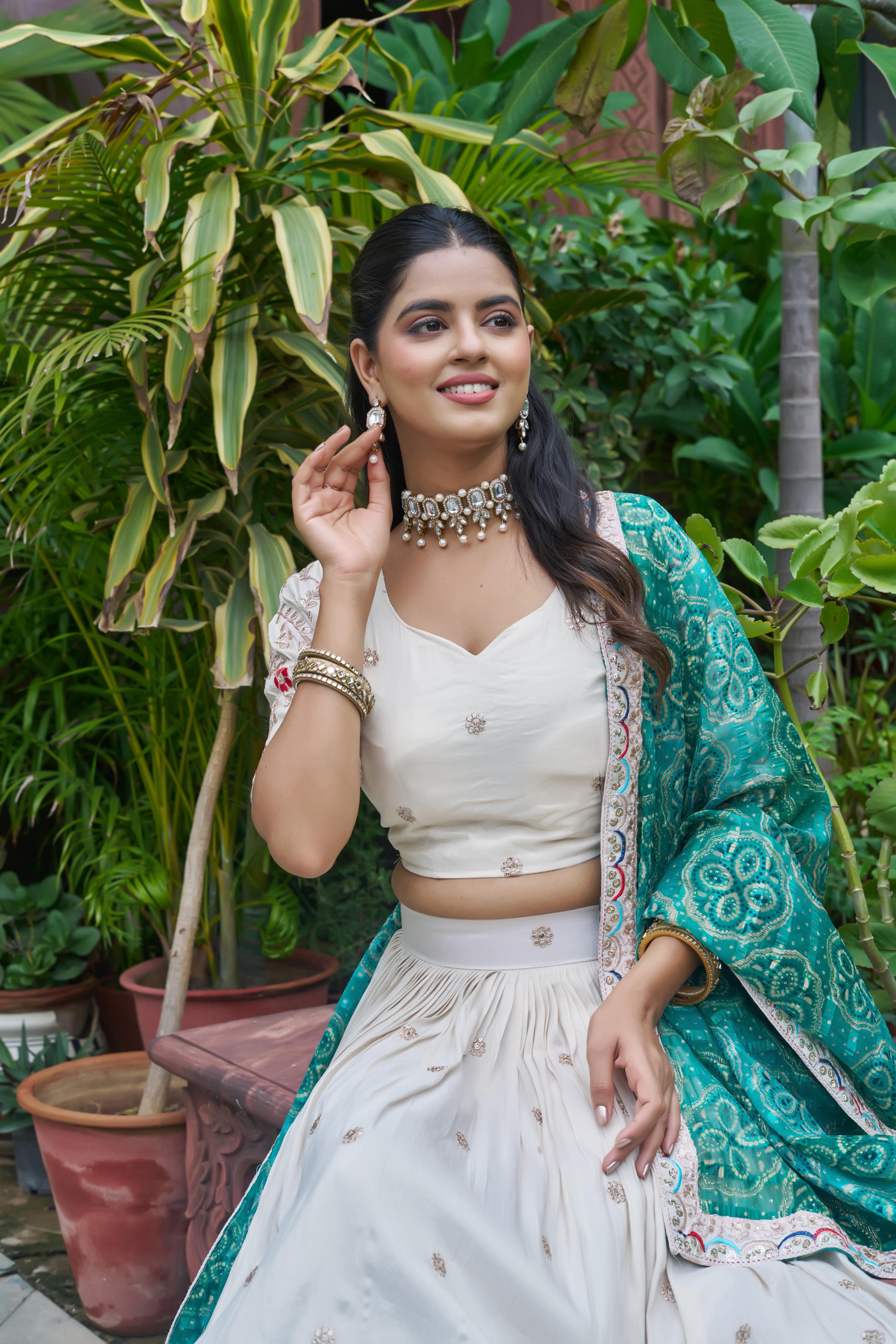 Close-up embroidery on tissue silk choli