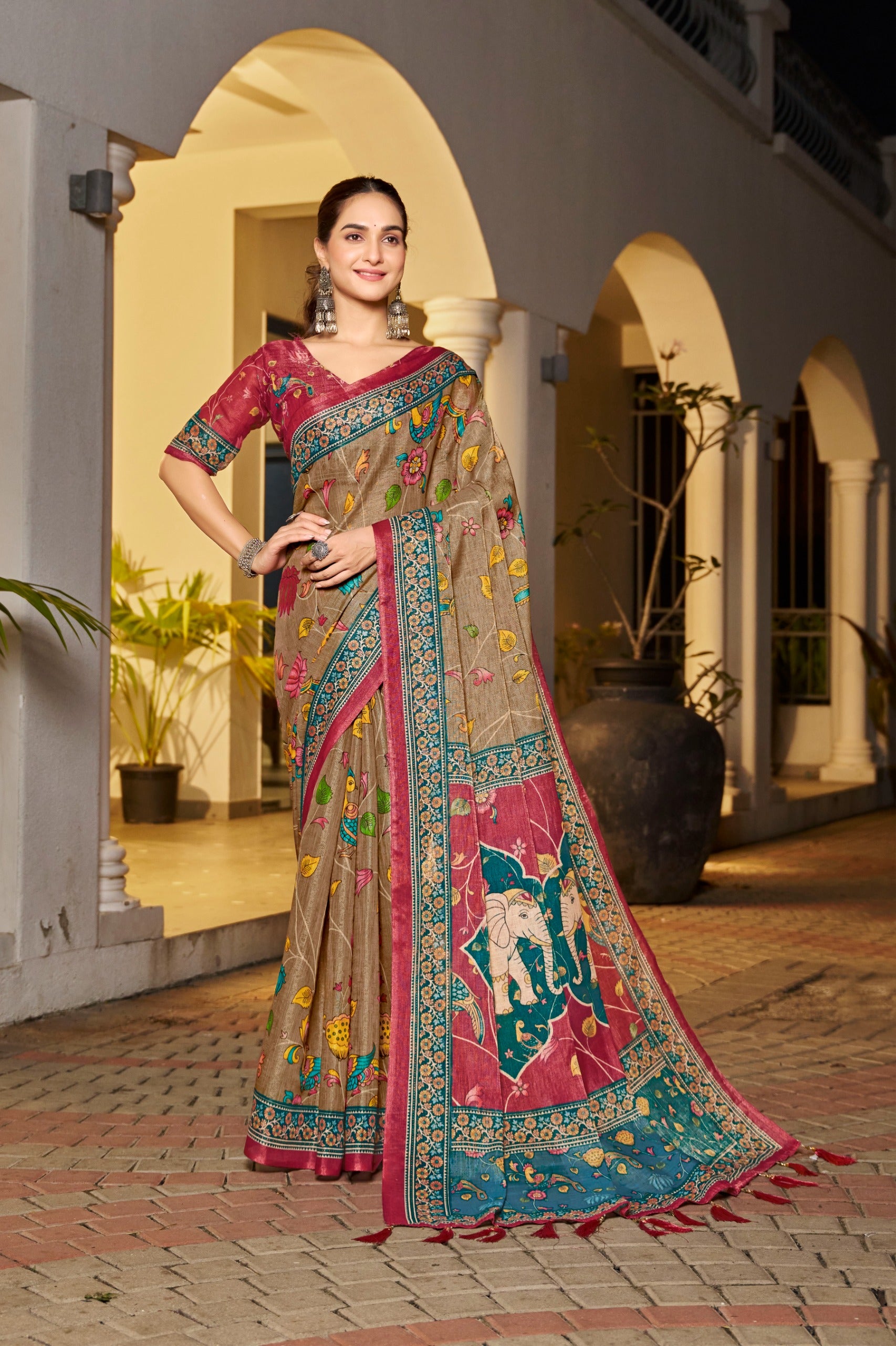 Beige handloom saree with maroon blouse and teal border