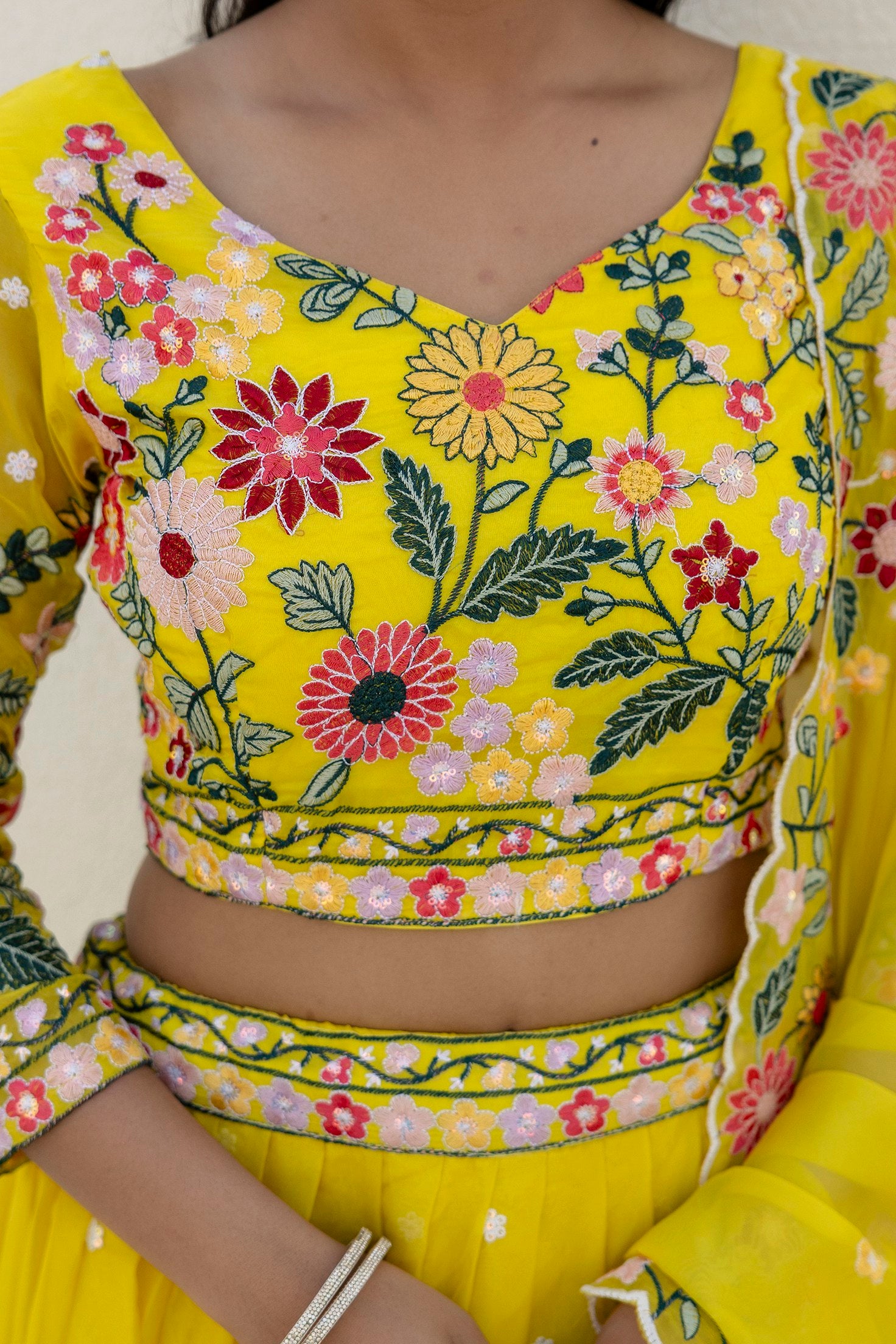 yellow organza lehenga choli