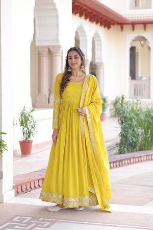 Full-length view of Vichitra Silk gown yellow color with sequins embroidery