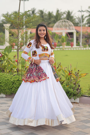 White lehenga choli with ribbon lace detailing

